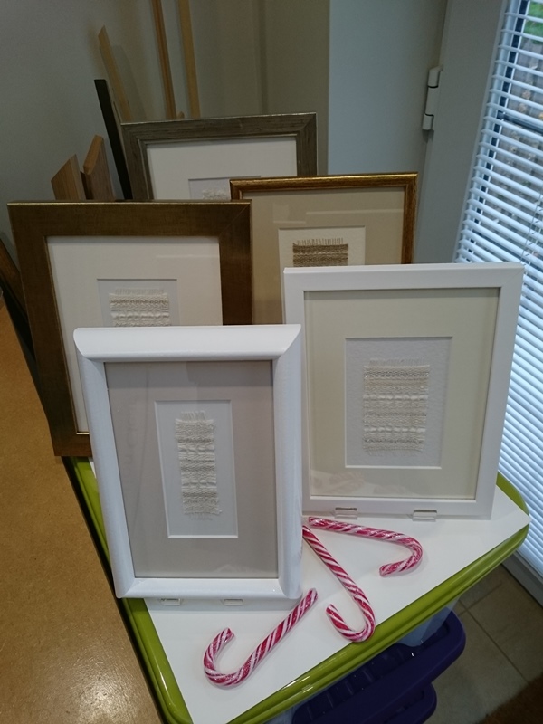 Framed presents waiting for a home.